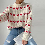 Suéter decretado en el corazón tejido