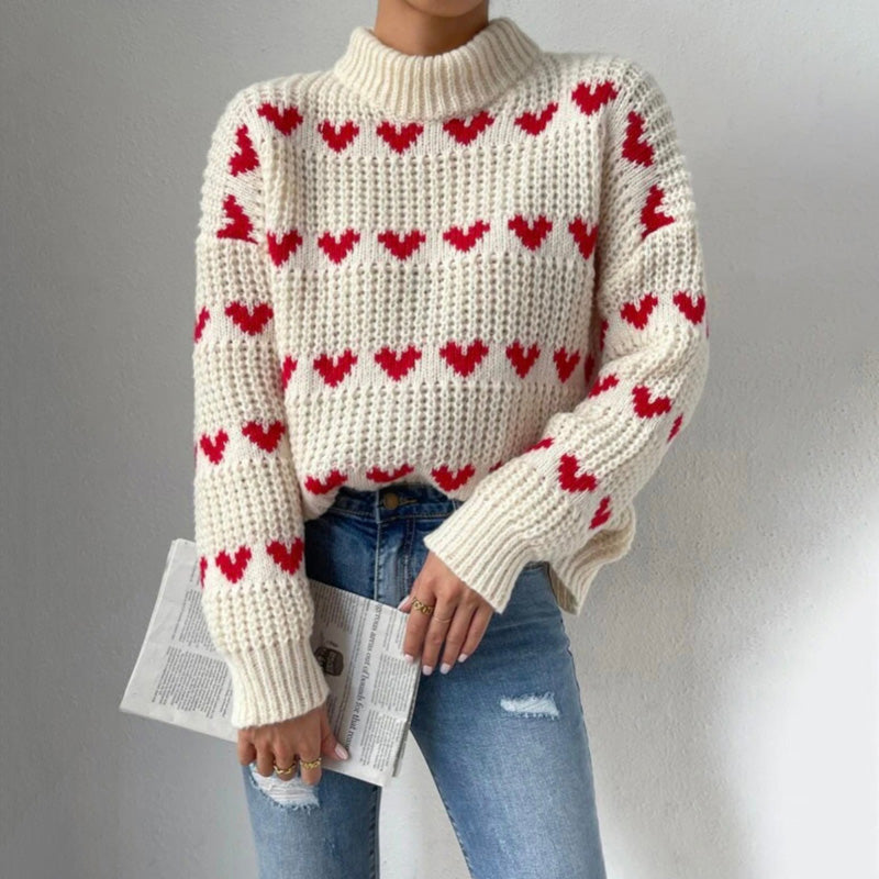 Maglione decretato nel cuore a maglia