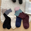 Peoked -sukat värillisillä lohkoilla